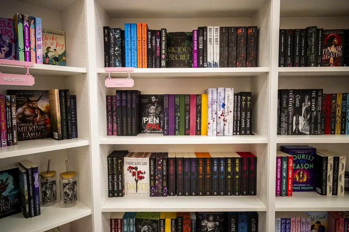 The front room of Evermore Books, shelves stocked with romance titles